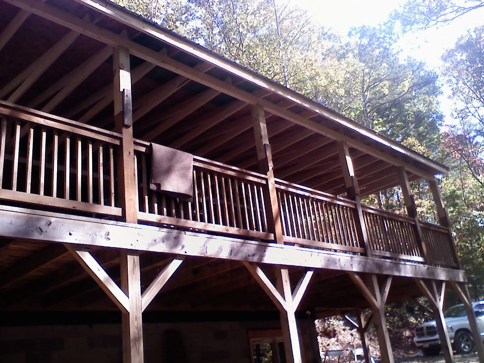 Timber framing under a new elevated porch and deck — Roof Leak Repair in Massillon by Roofing Brothers